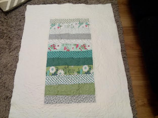 Illustration for article titled I just finished my first stippled quilt!
